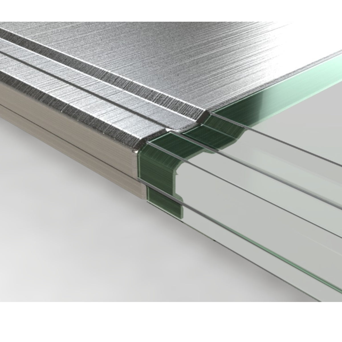 Close-up of a stack of transparent glass panels with a brushed silver metal edge and a green protective film or backing visible along the side.
