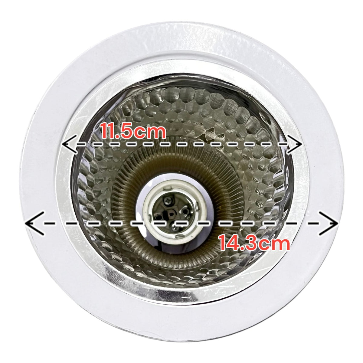 Close-up of a kitchen sink drain with measurements indicated