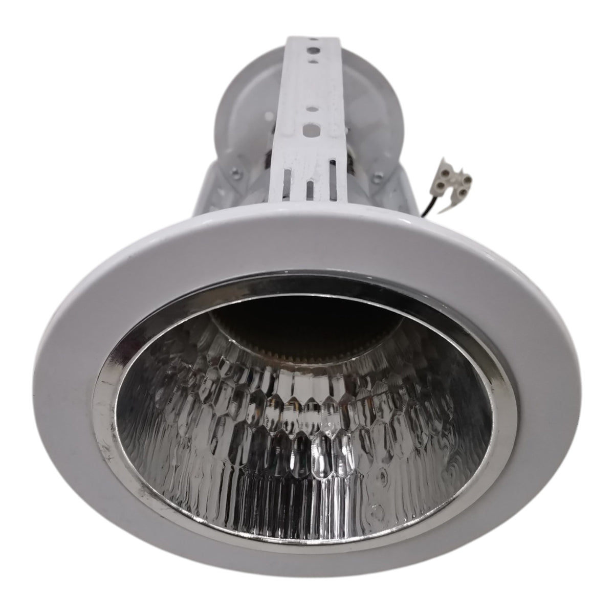 Recessed ceiling light with silver metal housing on a white background