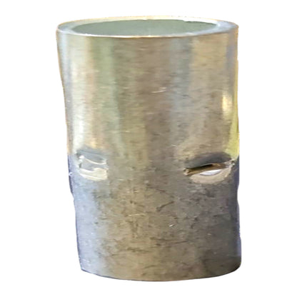 A cylindrical metal sleeve or connector with two small horizontal slots on the side, shown against a plain white background.
