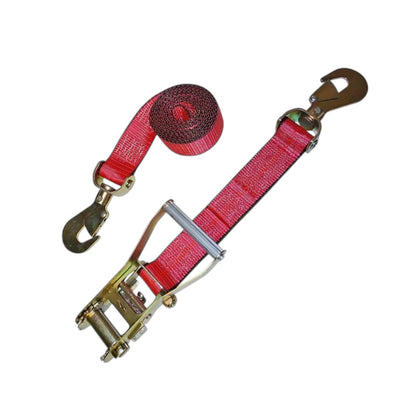 A red webbed ratchet strap with gold-toned metal hardware, including hooks and a release buckle, shown on a plain white background.