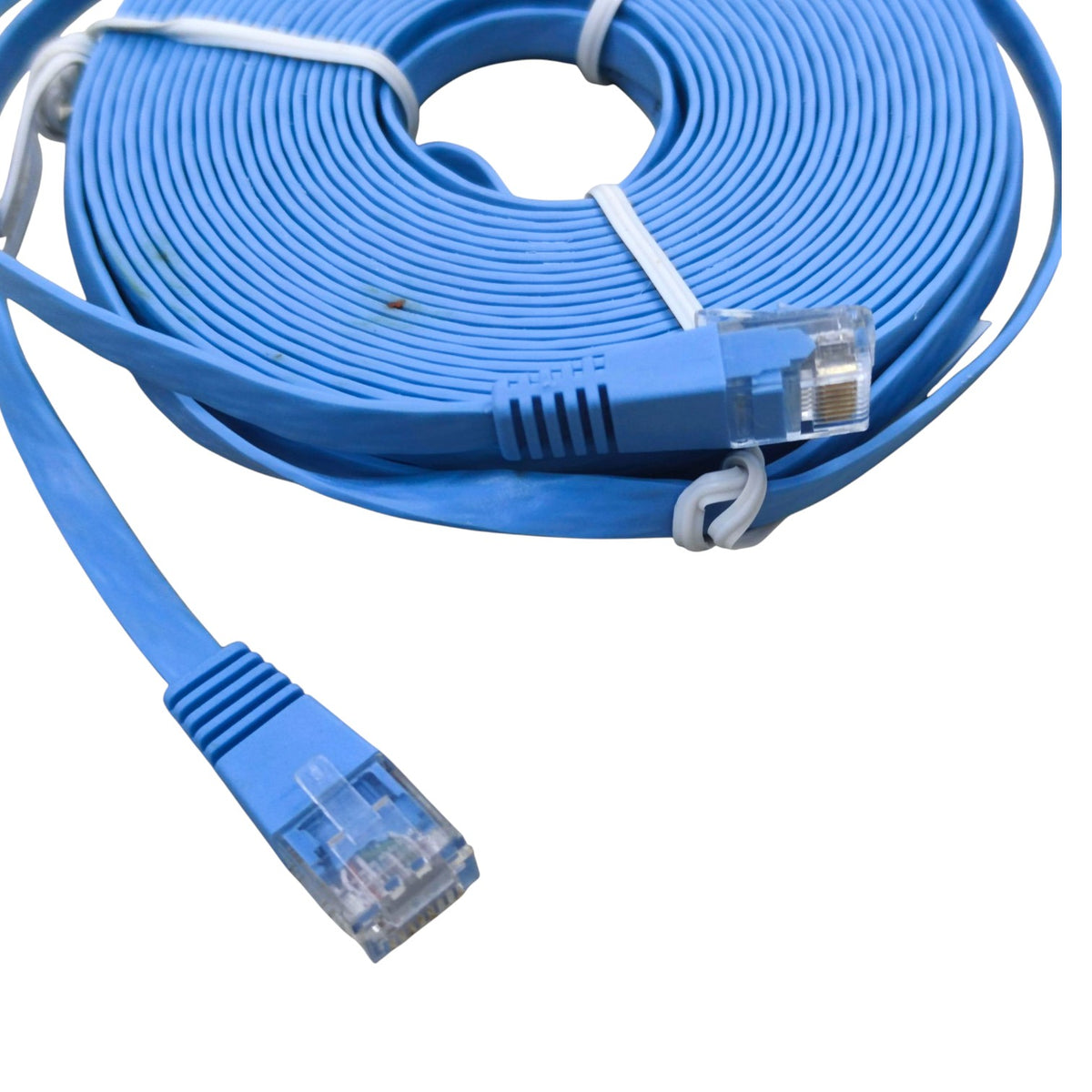 A coiled blue Ethernet cable with RJ45 connectors, secured with white zip ties, on a plain white background.