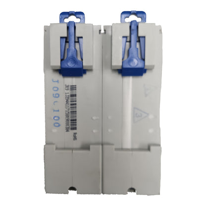 Two modular electrical circuit breakers, likely DIN rails, featuring light gray plastic housings and blue latch mechanisms, shown against a plain white background.
