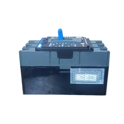 A heavy-duty automotive battery with a black plastic casing, a blue top handle, and a silver terminal label, shown against a plain white background.