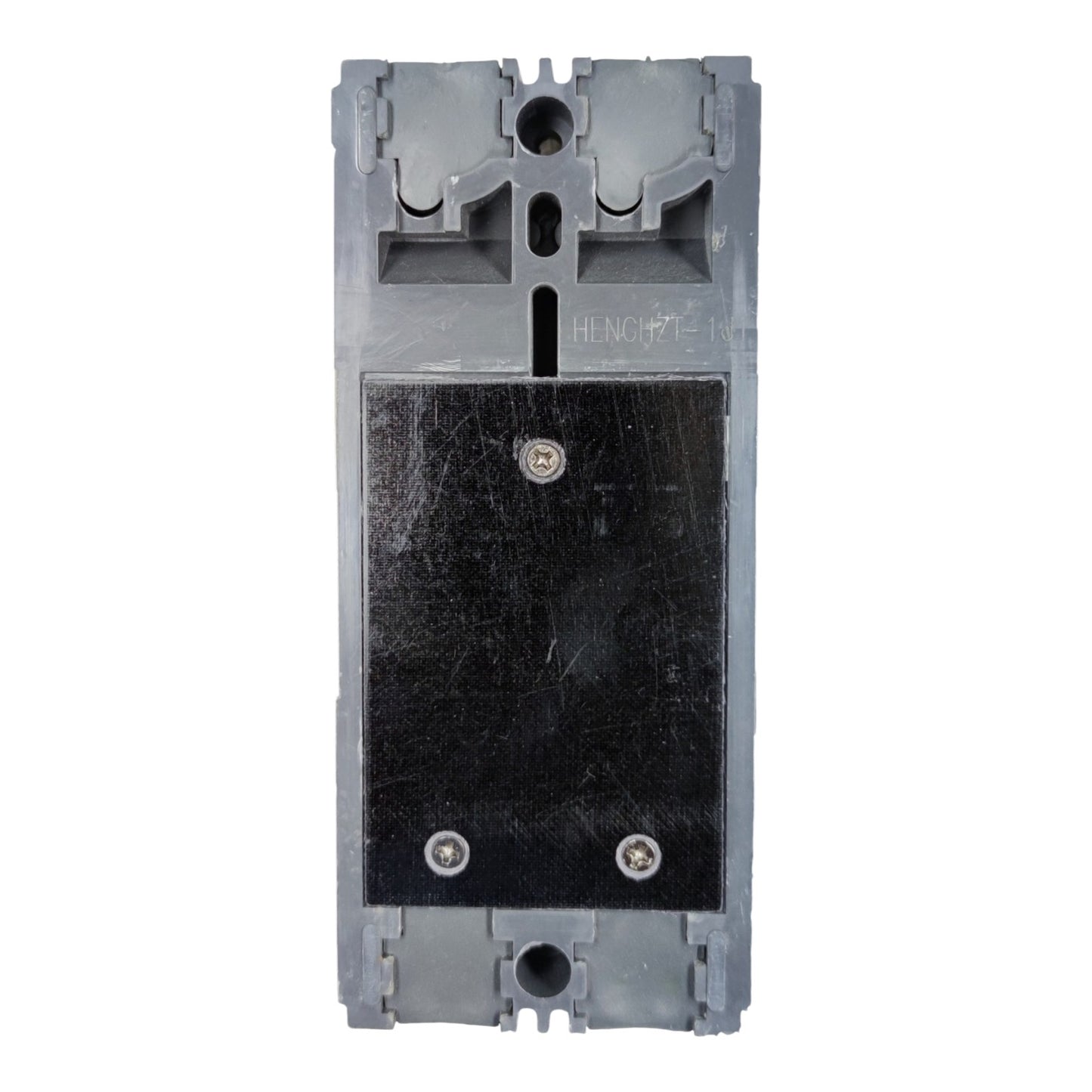 A gray plastic electrical component or switch module with a large black rectangular panel secured by screws, shown against a plain white background.