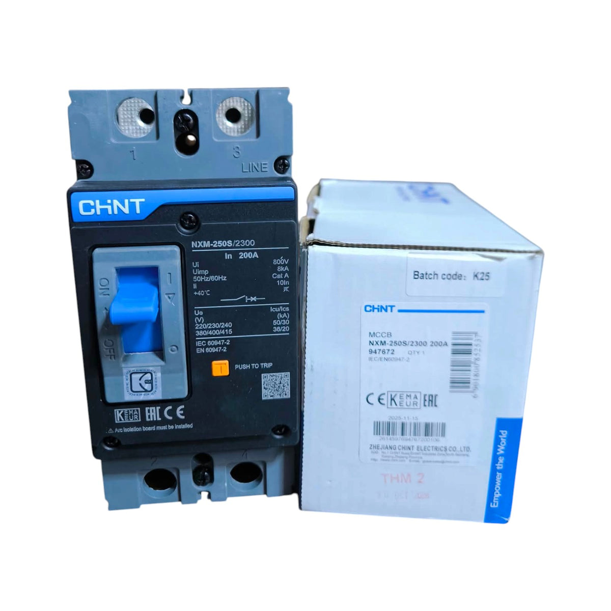 A CHINT molded circuit breaker shown next to its original white and blue packaging box on a plain white background.