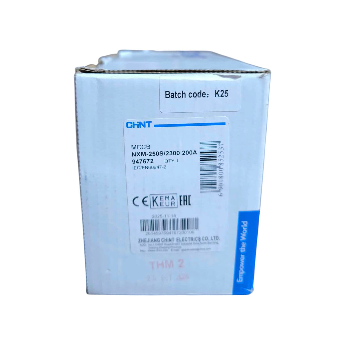A white cardboard box for a CHINT MCC9 NXM-250S/2300 200A electrical component, with blue printed text and barcodes on a white background.