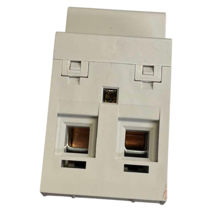 Light gray electrical wall plate with multiple sockets on a white background
