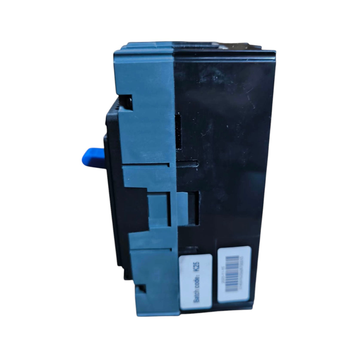 A black and dark blue electrical circuit breaker or switch component with a small blue handle and a white barcode label, shown on a plain white background.
