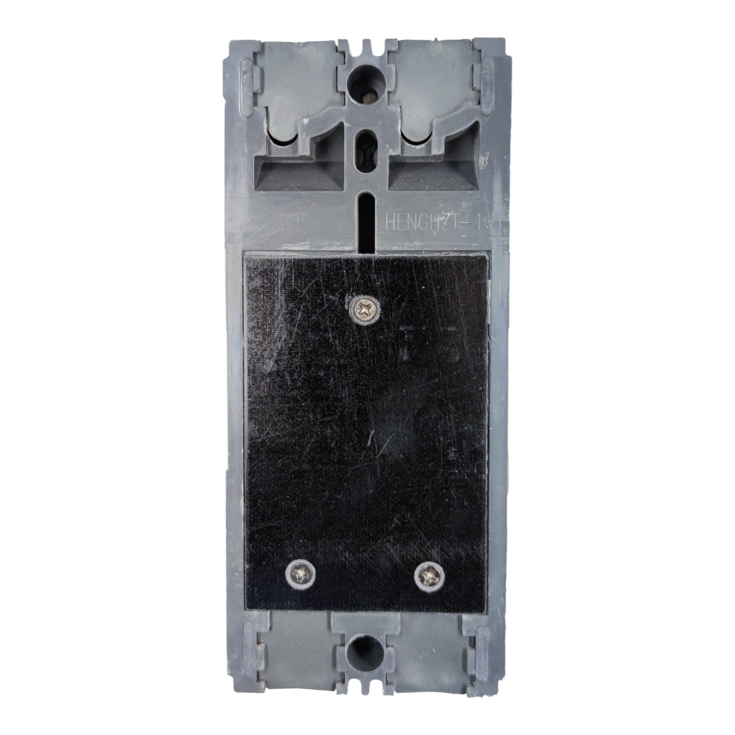 A gray plastic electrical component or switch module with a large black rectangular panel secured by two screws, photographed against a plain white background.