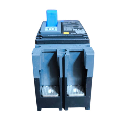 A dark gray plastic electrical terminal block with two open slots and a blue top switch, shown on a plain white background.