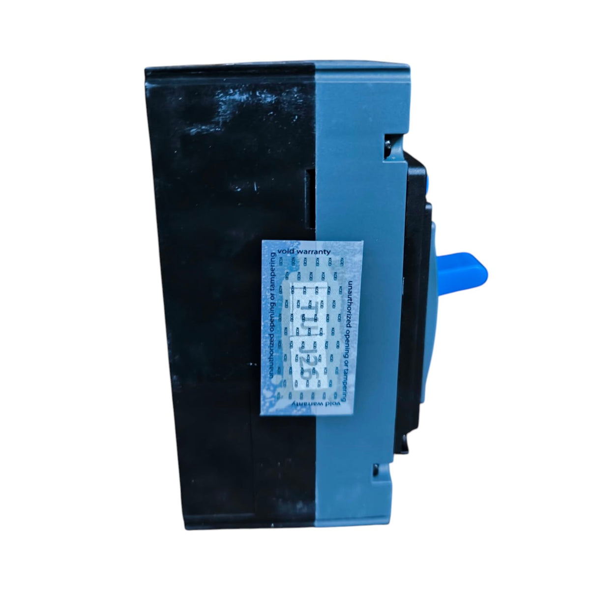 A black and blue electrical component or terminal block with a small blue switch handle and a white identification sticker on the front, isolated on a white background.