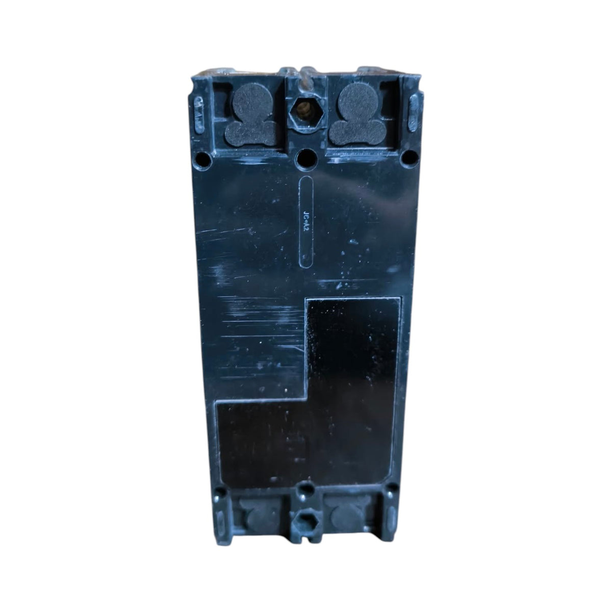 A dark blue-gray plastic electrical component or terminal block, shown from the back against a plain white background.