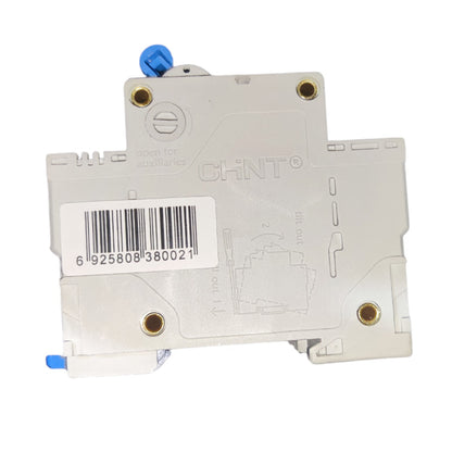 A CHNT electrical contactor or relay component, photographed from the back side. The main body is a light gray plastic housing with brass screw terminals, a white barcode label, and small blue plastic components at the top and bottom.