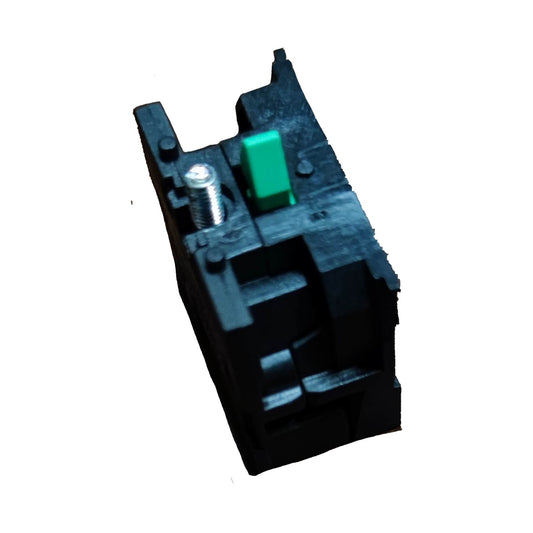 A black plastic electrical switch component with a small green toggle switch and a silver screw terminal, isolated on a white background.