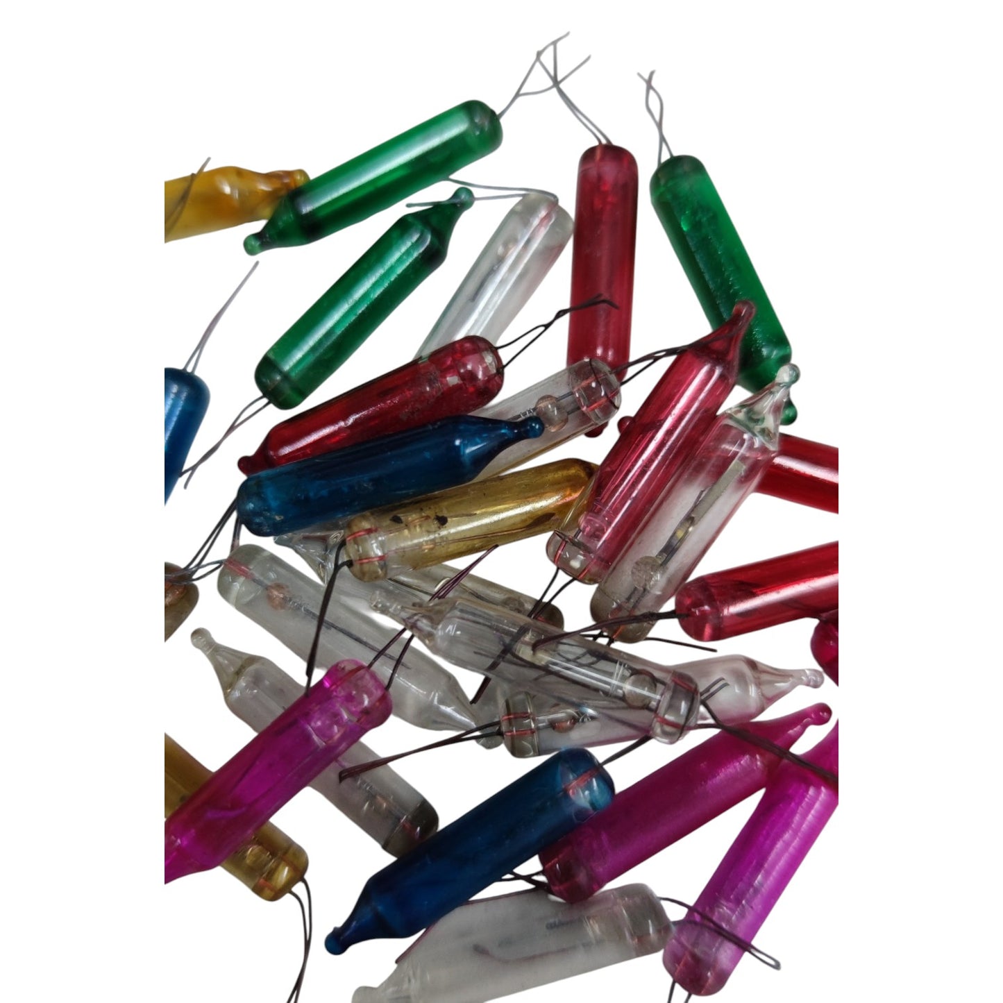 Colorful glass tubes with wires on a white background
