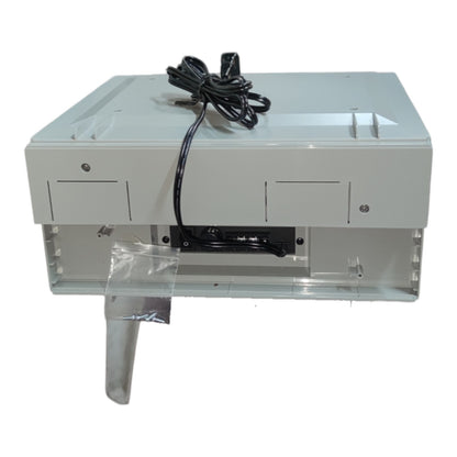 White electronic device with a power cord on a white background