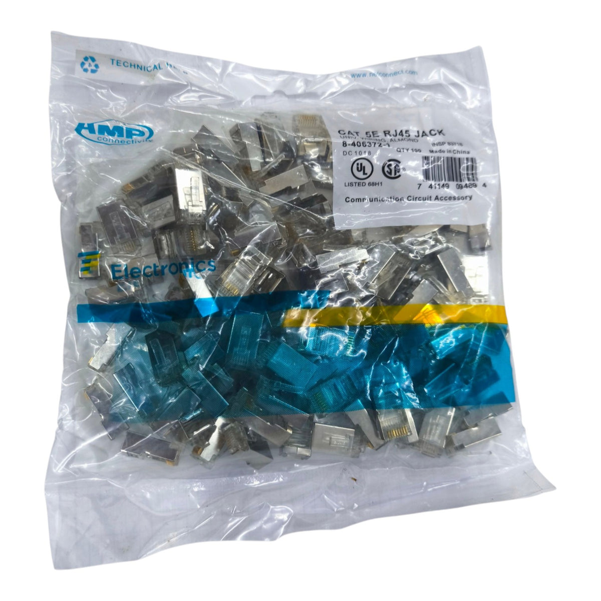 A clear plastic bag containing many small electronic components, with a white label reading 'SOT-143 TAP CIRCULAR ACCESSORY' and visible HMP Electronics branding. The components appear metallic silver and blue-tinted.