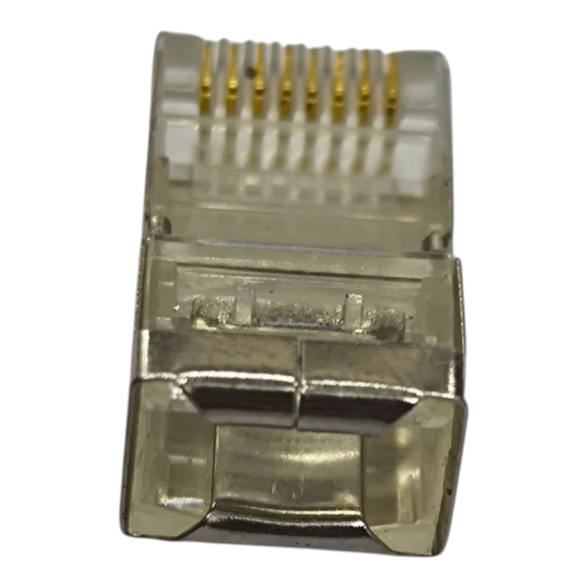 A single RJ45 Ethernet connector with gold-plated pins and a clear plastic housing, shown against a plain white background.