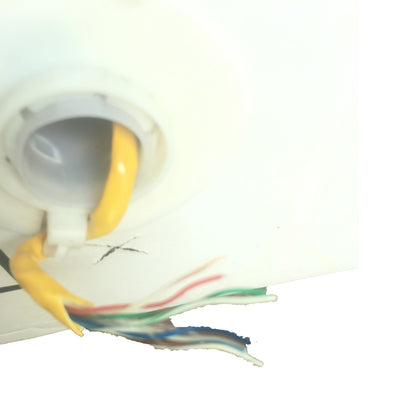 Close-up of a white ceiling light fixture showing a yellow cord entering the socket and several multicolored wires extending out against a white background.