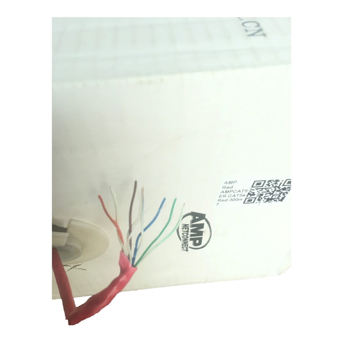 A close-up of a white AMP Metering Products device showing a red wire connector with several exposed internal wires in red, white, brown, green, blue, and orange, alongside printed specifications and a QR code.