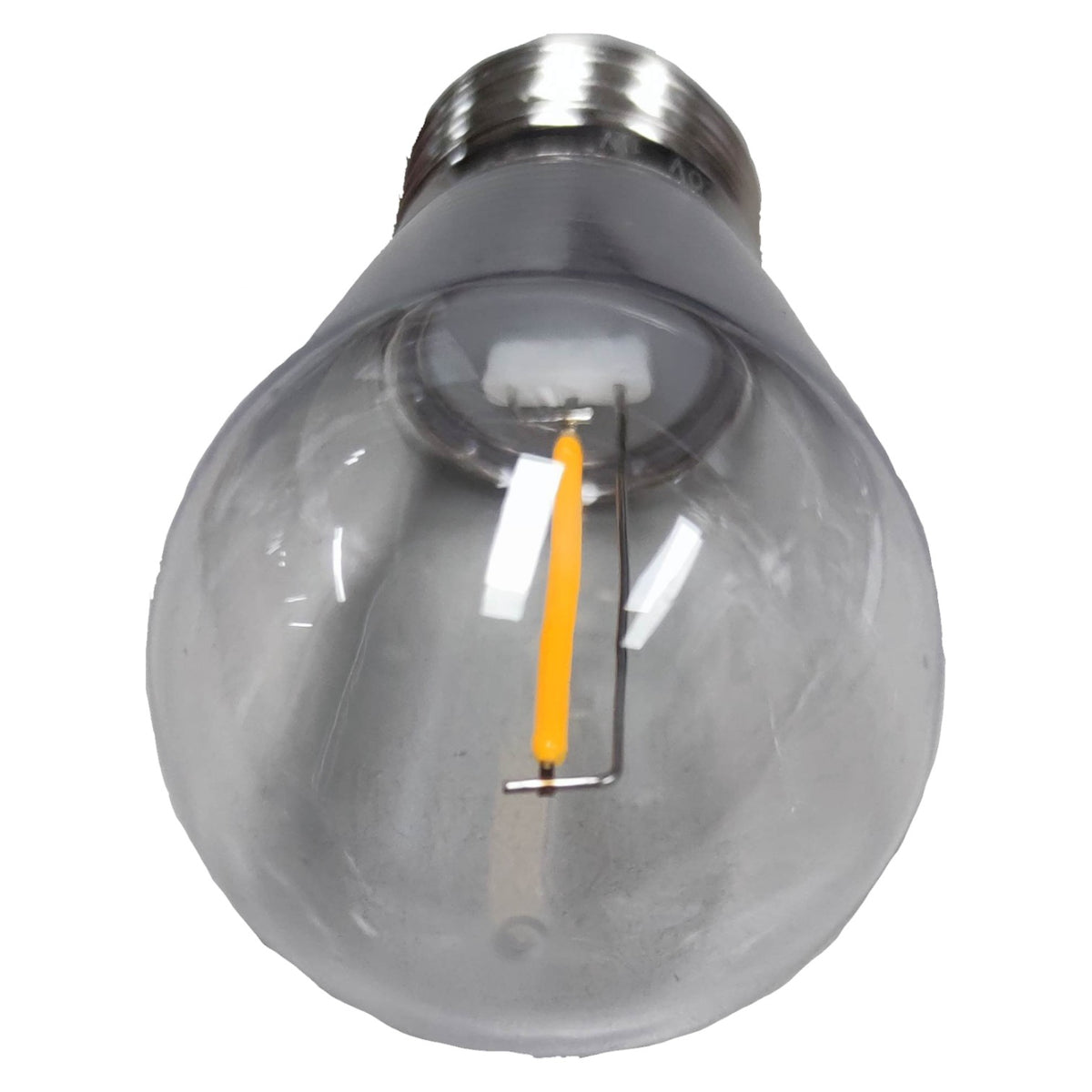 Clear light bulb with visible filament on a white background