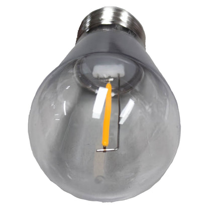 Clear light bulb with visible filament on a white background