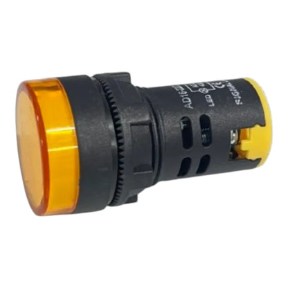 An industrial push-button indicator light with a black plastic housing, a translucent amber-yellow lens, and yellow terminal covers on a white background.