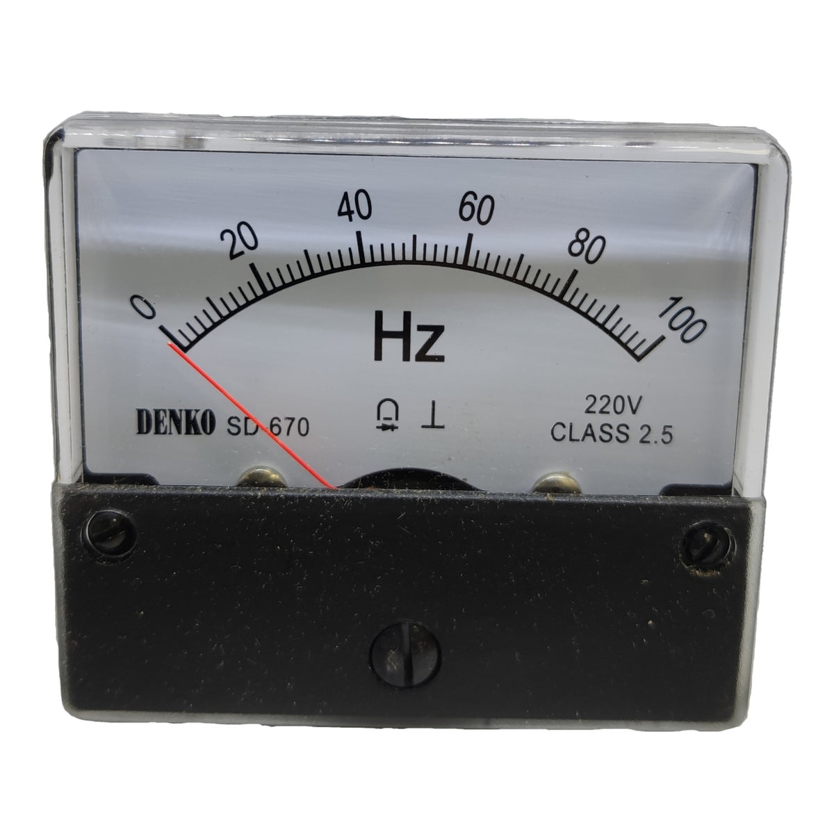 A Denko SD-670 analog frequency meter with a black housing, clear protective glass cover, and a white dial face showing Hz markings from 0 to 100.