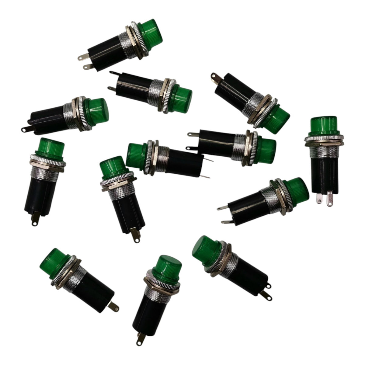 Ten small green and black push-in button switches with silver metal contacts, arranged on a plain white background.