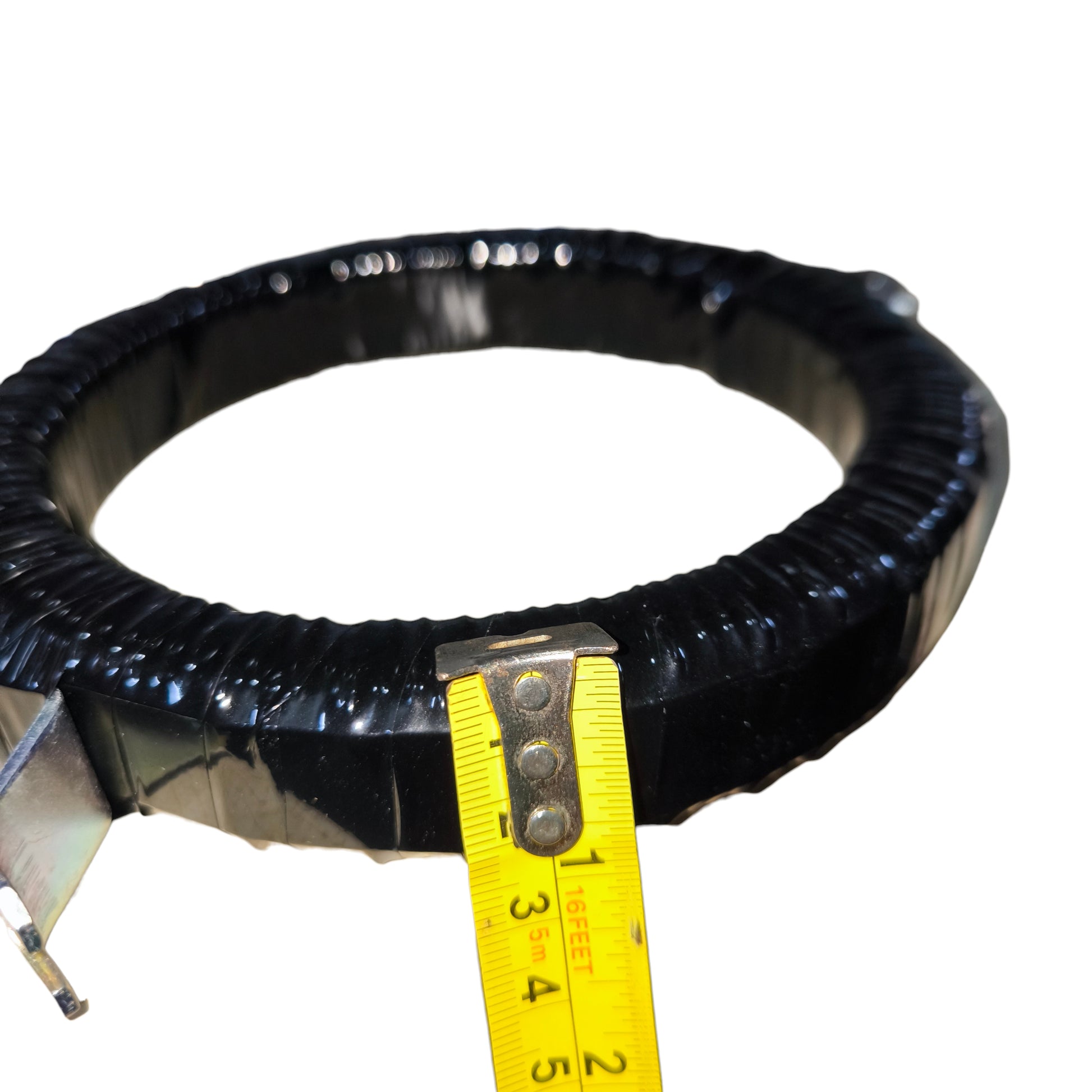 Black rubber hose with a yellow measuring tape showing measurements on a white background Dixsen Current Transformer MR-125 2500:5A Donut Type Electx Electrical Supply