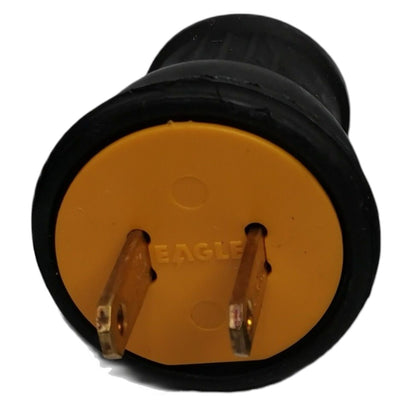An Eagle electrical plug with a black rubber body, a yellow-orange plastic base, and two brass pins, shown against a plain white background.