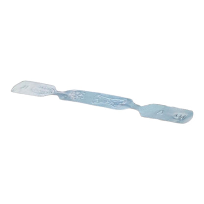 A translucent light blue plastic spreader or scraper tool with a flat blade on one end and a textured handle on the other, shown against a plain white background.