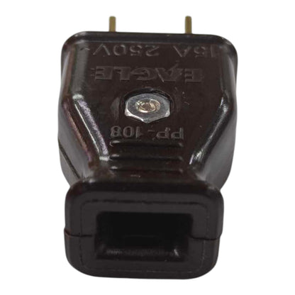 A black plastic electrical plug adapter with two gold metal pins, featuring embossed text including 'EAGLE' and '250V 16A'.