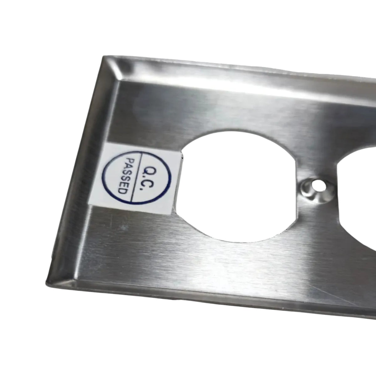 A brushed stainless steel electrical outlet cover plate with two circular cutouts, shown on a white background with a small 'PASSED O.C.
