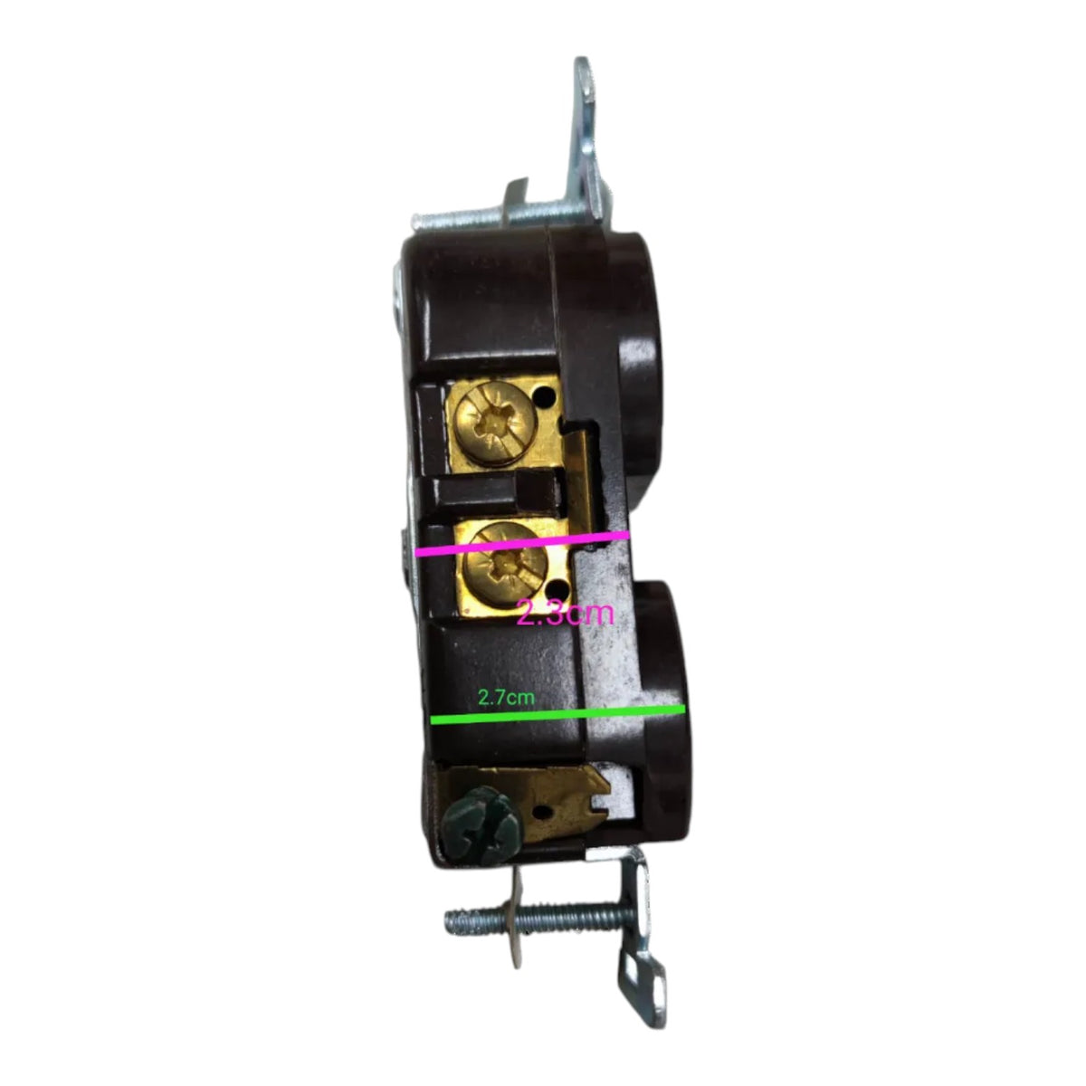 A dark brown electrical outlet or switch component with brass screw terminals, shown on a plain white background with pink and green dimension lines and text indicating 2.9cm and 2.