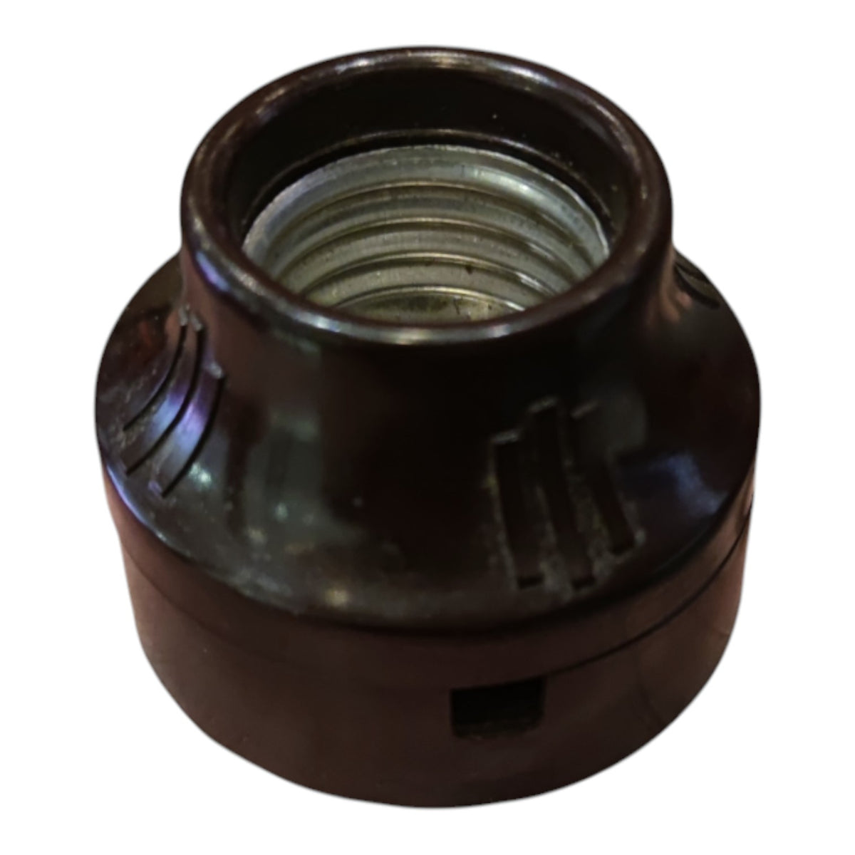 A dark brown plastic electrical outlet adapter with a threaded male socket, shown on a plain white background.