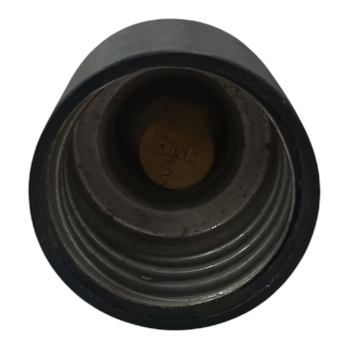 A close-up view of a black plastic threaded cap or connector showing the inner threaded opening and a small stamped marking inside.