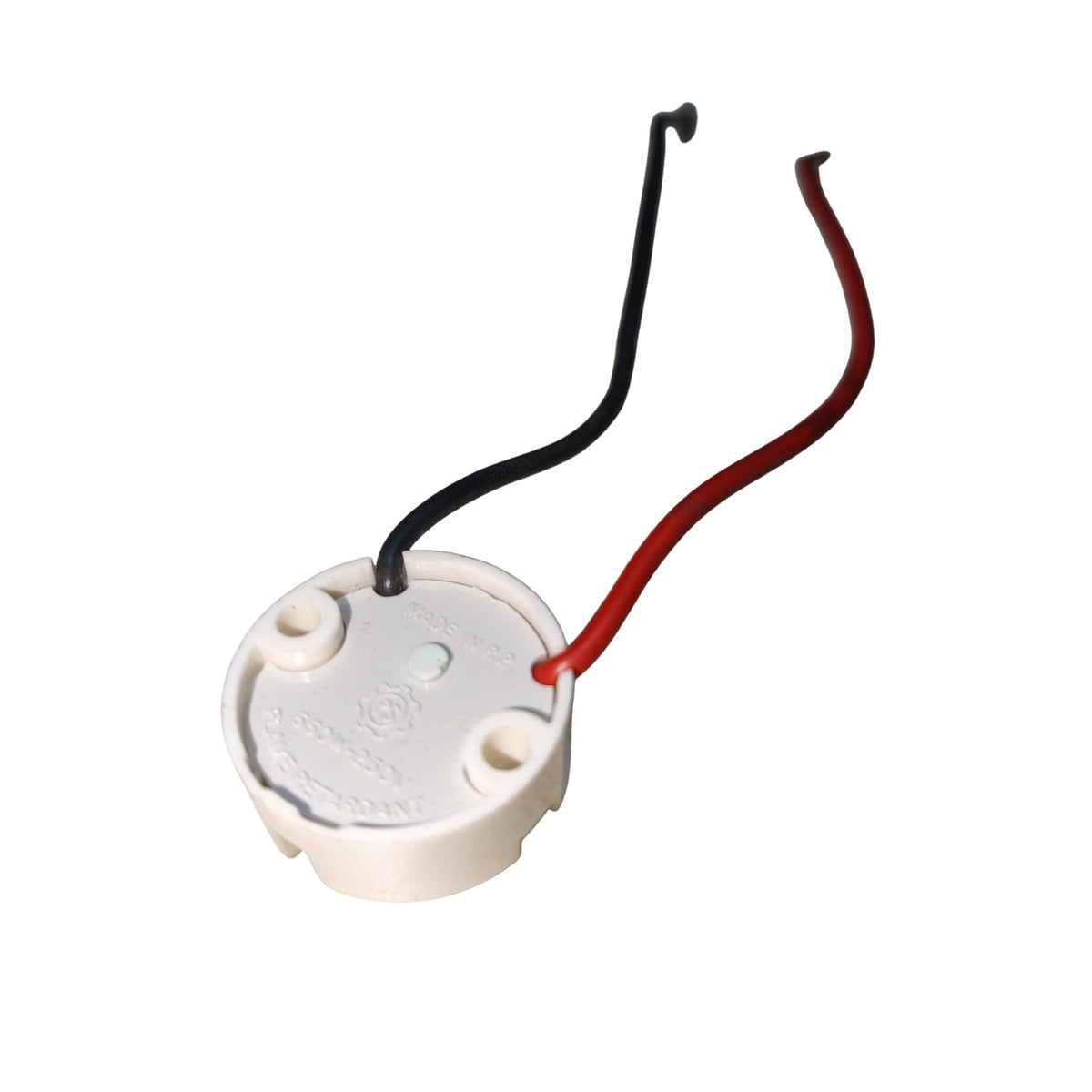A white plastic electrical terminal block with two attached wires, one black and one red, shown on a plain white background.