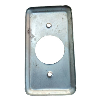 A rectangular metal plate with rounded corners, featuring a large circular cutout in the center and two small screw holes, shown on a plain white background.