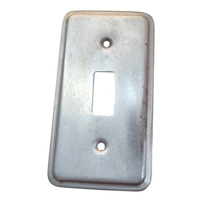 A rectangular metal light switch plate cover with a single toggle slot in the center and two screw holes, shown on a plain white background.
