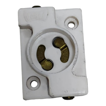 A white plastic 3-pin electrical outlet socket with gold-colored metal contacts, shown against a plain white background.