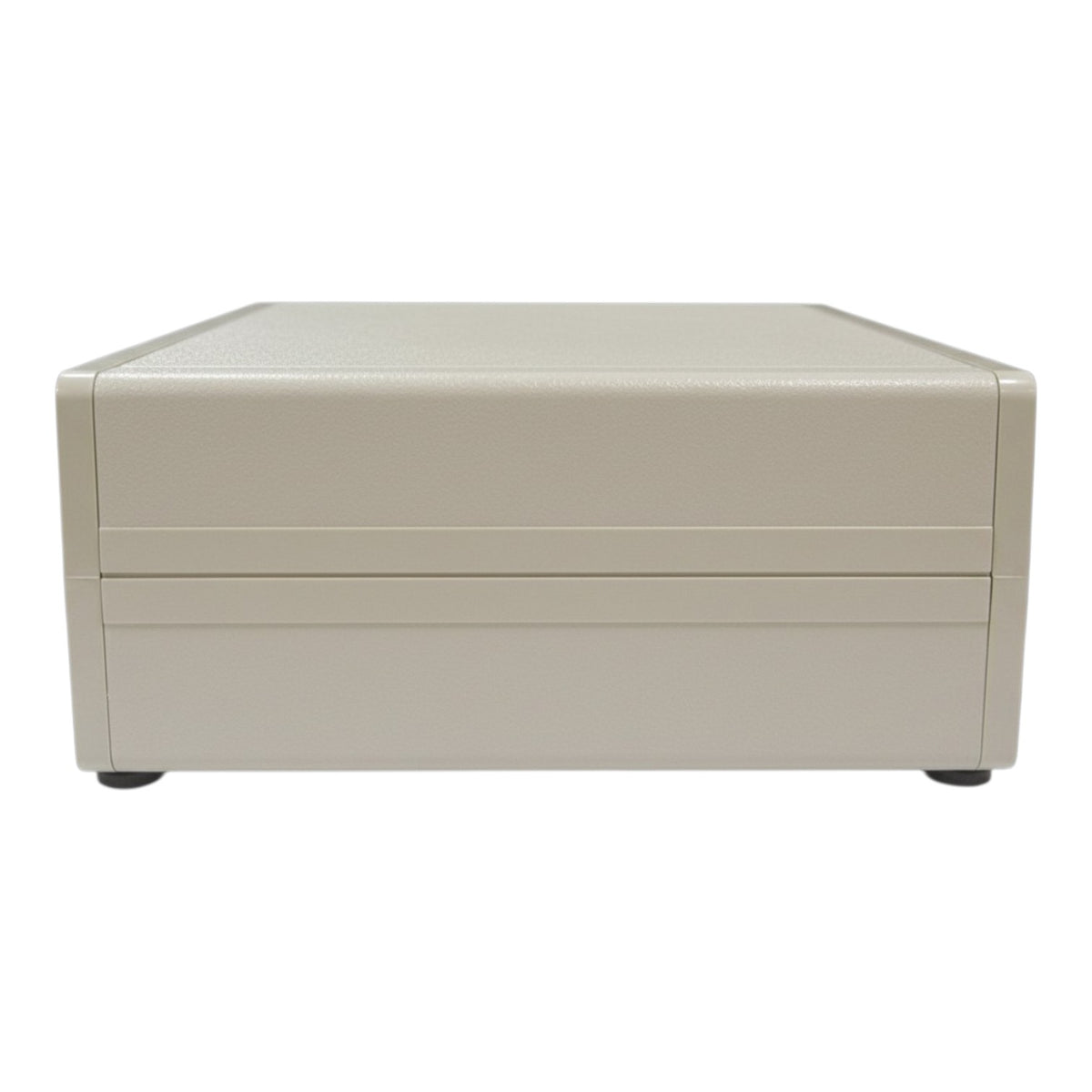 A beige rectangular storage box or drawer unit with a textured top surface and two horizontal front slots, shown against a plain white background.