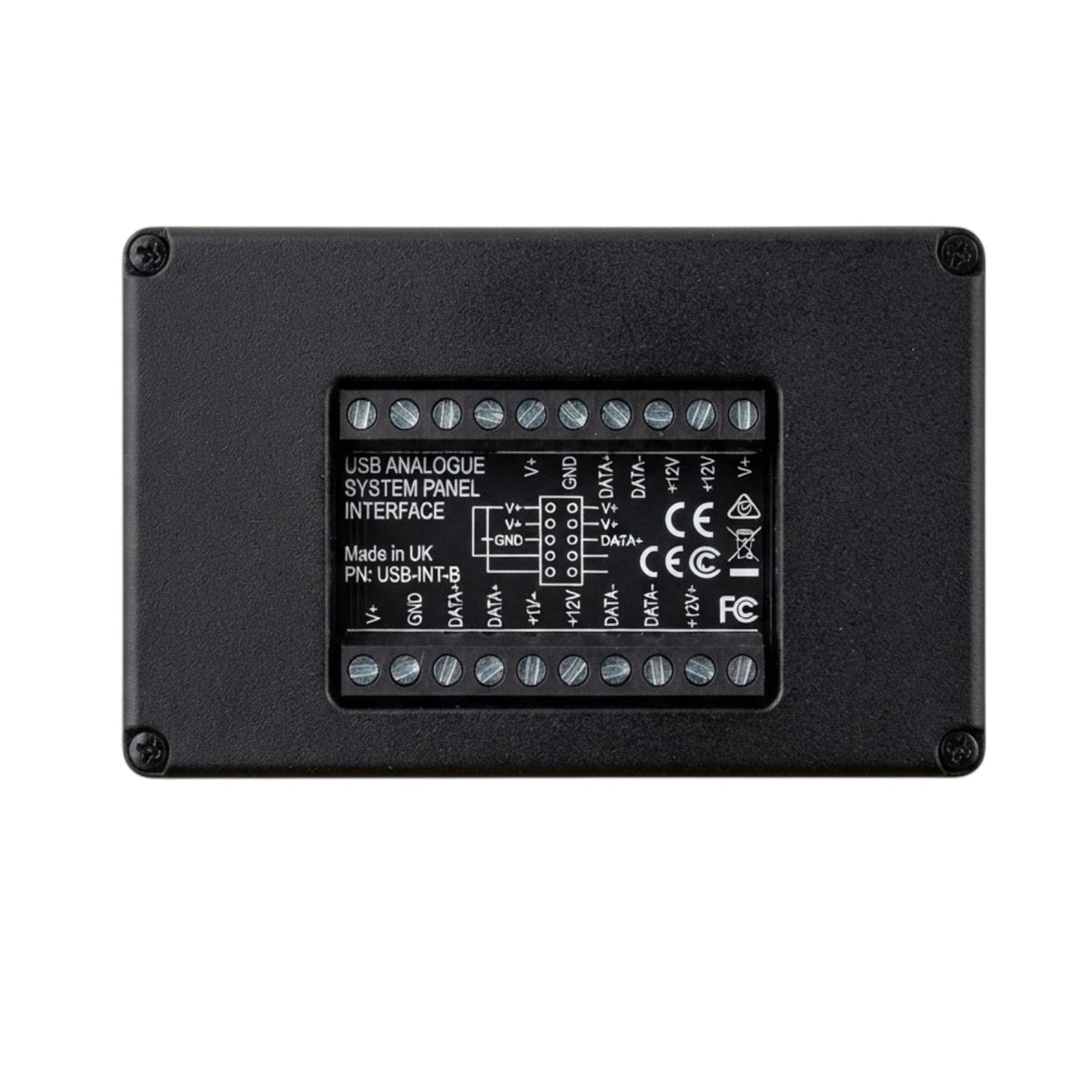 A black metal electronic module showing the back side with screw terminals and printed technical specifications for a USB analogue system panel interface.
