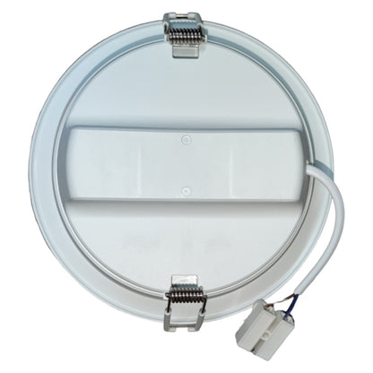 Round white light fixture with a cable on a white background