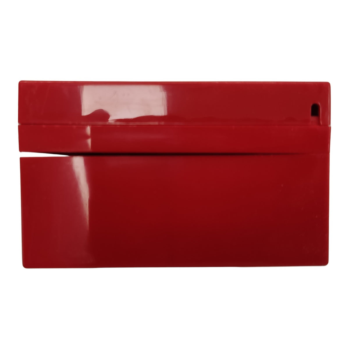 A glossy red rectangular plastic accessory, likely a small case or cover, shown against a plain white background.