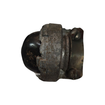 Rust-covered metal fitting on a white background