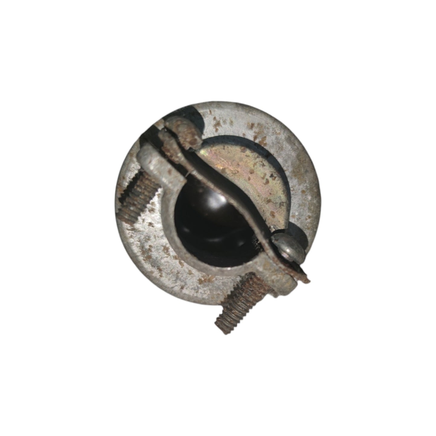 Rust-covered metal object on a white background