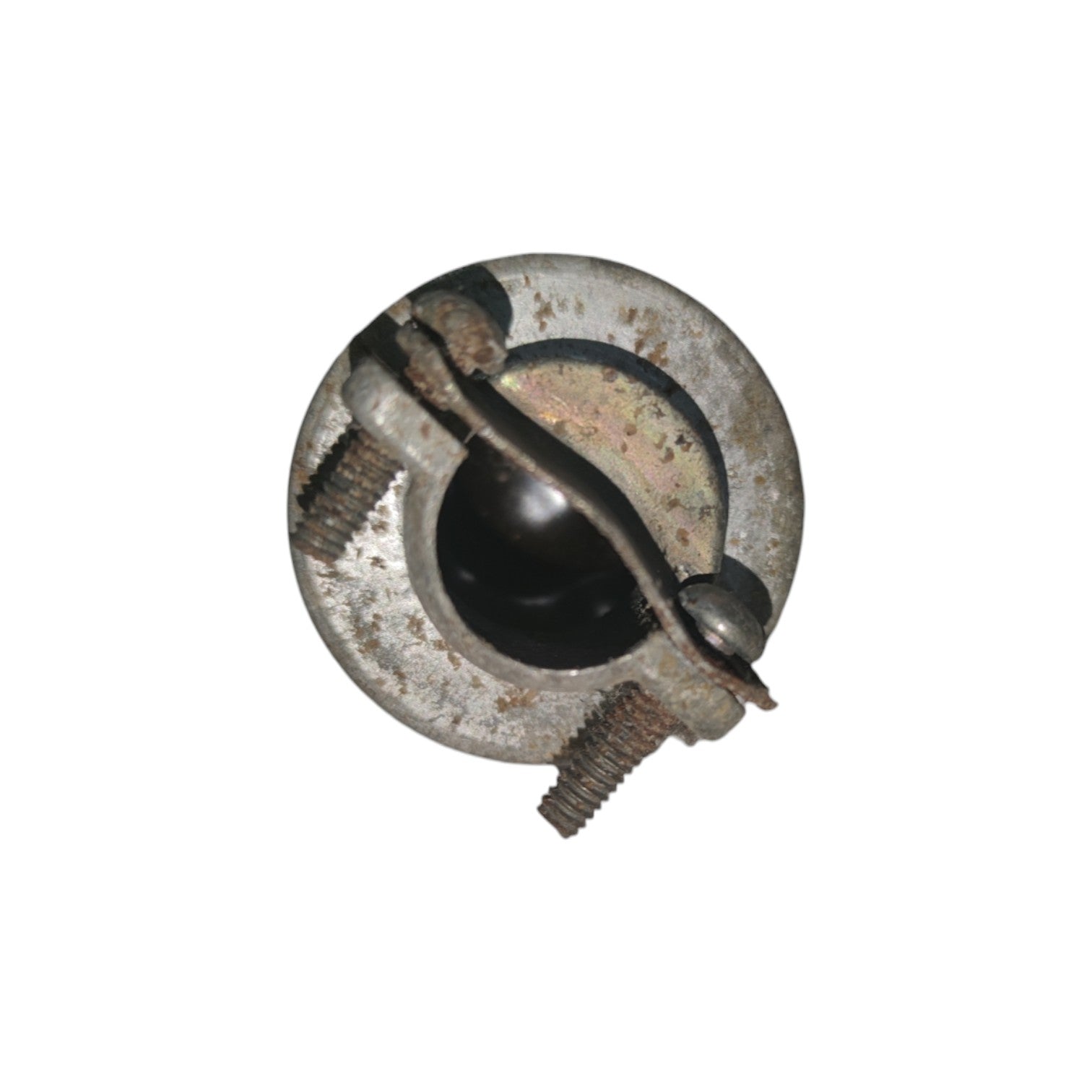 Rust-covered metal object on a white background