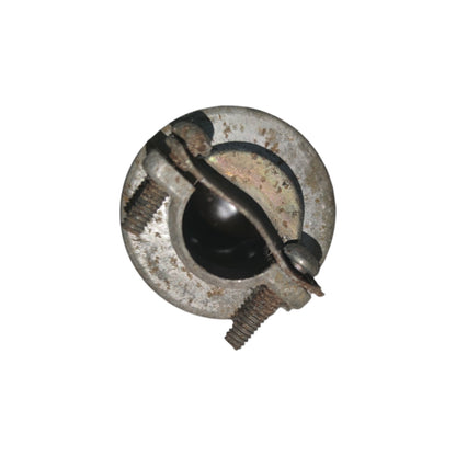 Rust-covered metal object on a white background